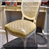 F60. Caned back desk chair. 40”h x 20”w x 22”d 